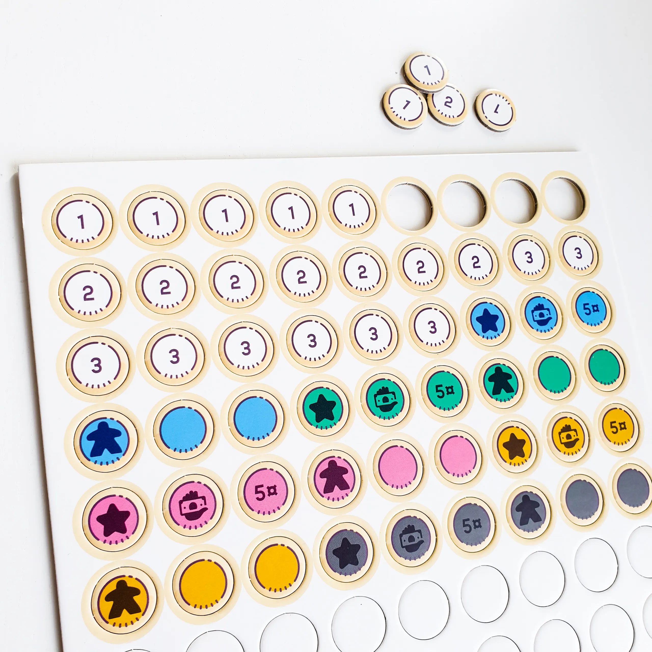 Partially punched Spyrium token sheet