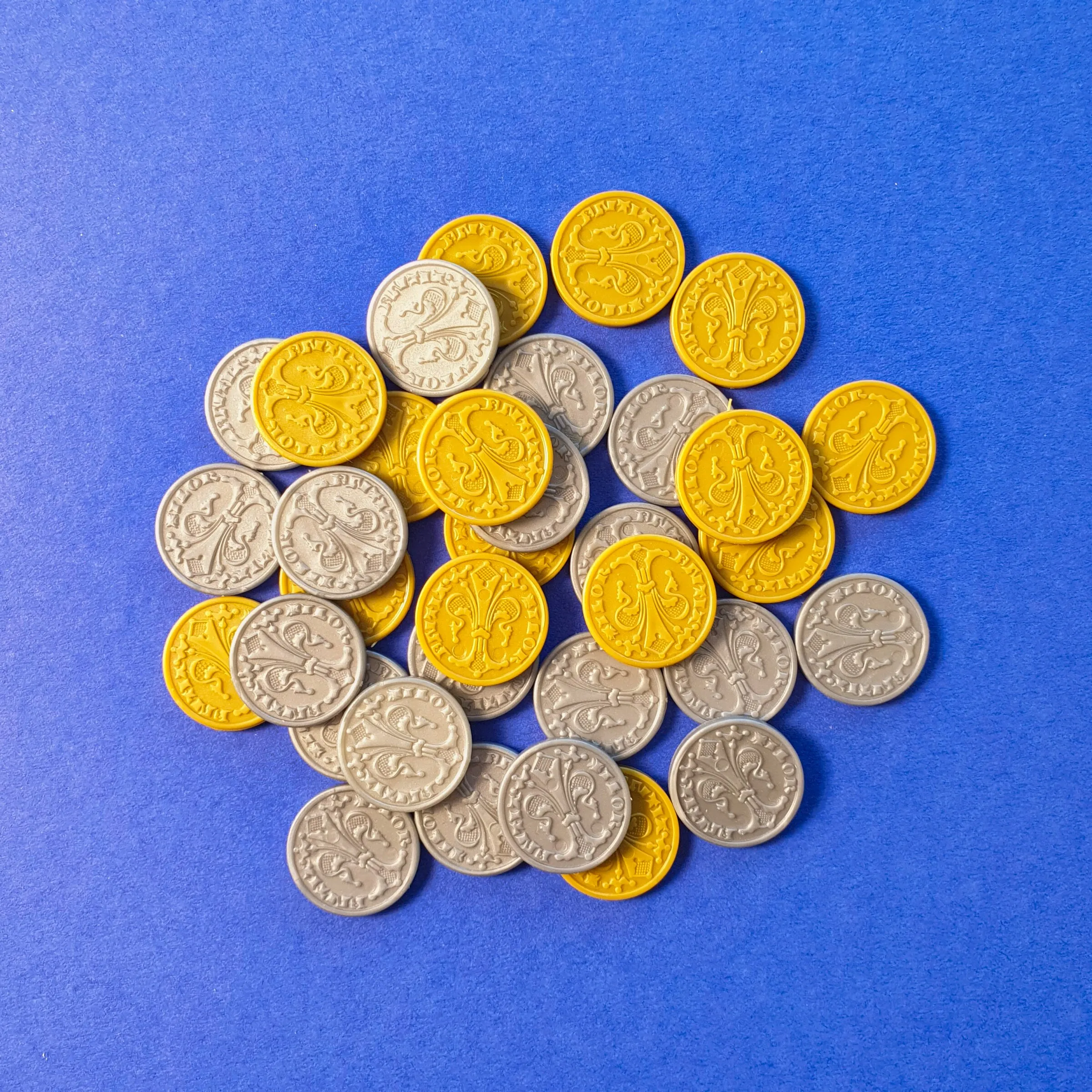 Plastic coins from the Kickstarter version