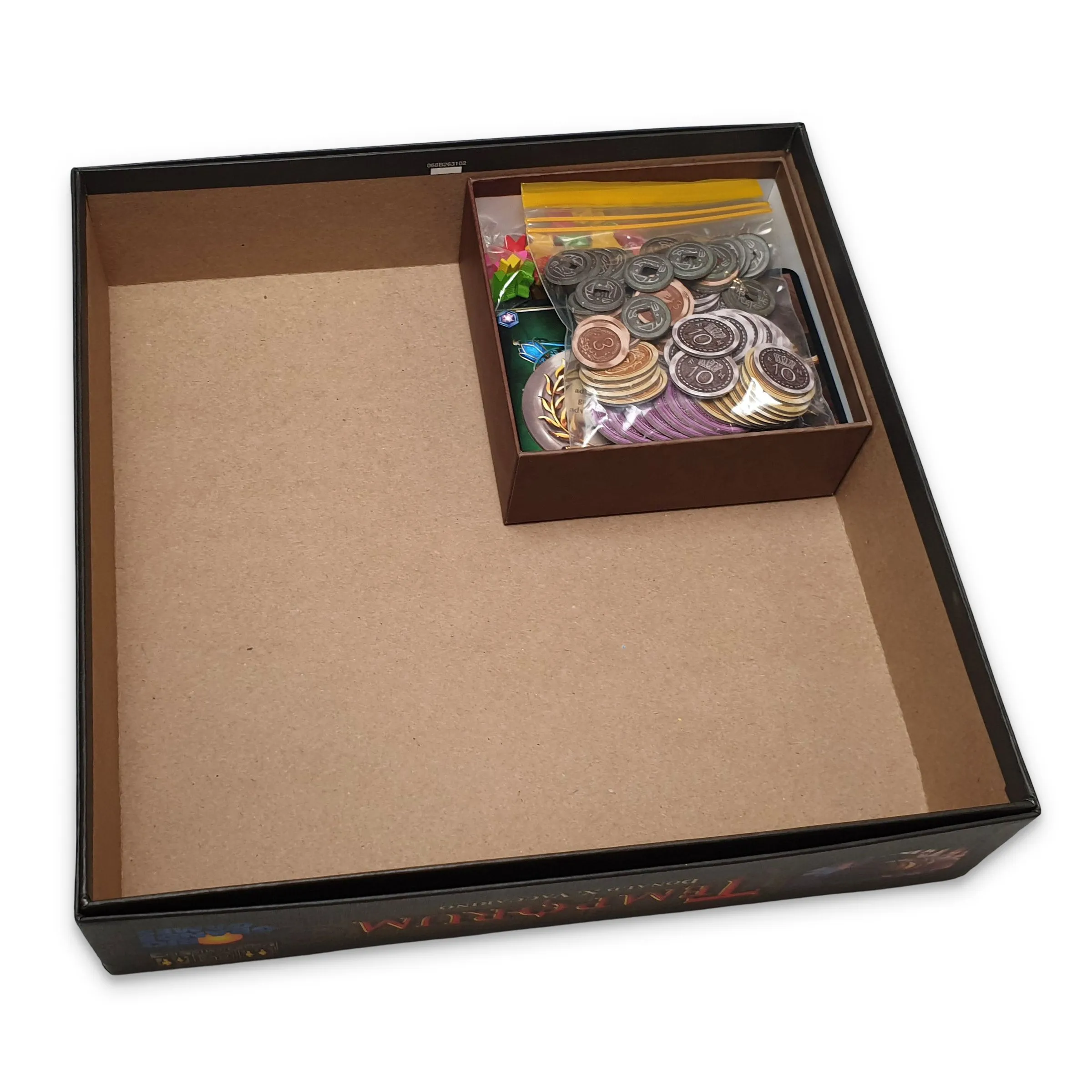My replacement box packed with cards and bagged tokens, nesting inside the much larger original box.